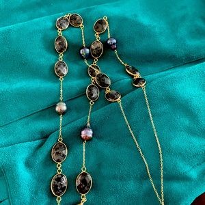 Long faux pearls with framed stones necklace